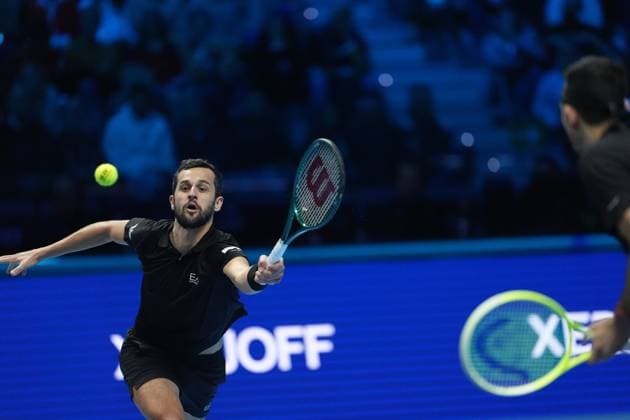 (241117) -- TURIN, Nov. 17, 2024 -- Marcelo Arevalo (R) of El Salvador and Mate Pavic of Croatia compete during the men s doubles semifinal match against Henry Patten of Britain and Harri Heliovaara of Finland at the Nitto ATP, Tennis Herren Finals in Turin, Italy, on Nov. 16, 2024. ) (SP)ITALY-TURIN-TENNIS-NITTO ATP FINALS-SEMIFINAL-MEN S DOUBLES LixJing 