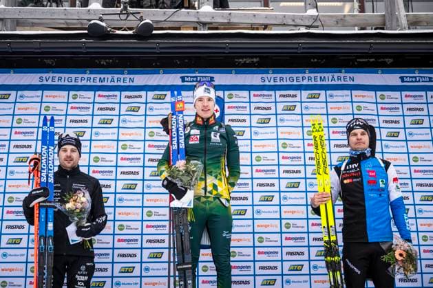 241117 Jesper Nelin, Sebastian Samuelsson of Sweden and Rene Zahkna of Estonia celebrate at the podium after the men s 10km sprint during the Swedish Premiere in biathlon on November 17, 2024 in Idre Photo Maxim ThorÃ BILDBYRAN code MT MT0696 biathlon biathlon sverigepremiären sverigepremiär swedish premiere sverige bbeng jubel  Copyright: MAXIMxTHORE BB241117MT032