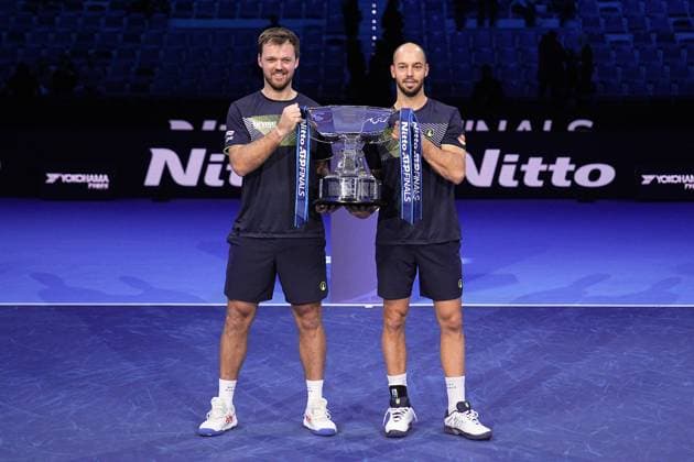 Germany s Kevin Krawietz, and Tim Puetz& xa0; celebrates with the trophy after winning the double final tennis match of the ATP, Tennis Herren World Tour Finals at the Inalpi Arena in Turin, Italy - - Sunday, November 17, 2024.  Copyright: xMarcoxAlpozzi LaPressex