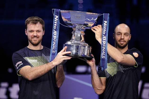 Germany s Kevin Krawietz, and Tim Puetz& xa0; celebrates with the trophy after winning the double final tennis match of the ATP, Tennis Herren World Tour Finals at the Inalpi Arena in Turin, Italy - - Sunday, November 17, 2024.  Copyright: xMarcoxAlpozzi LaPressex