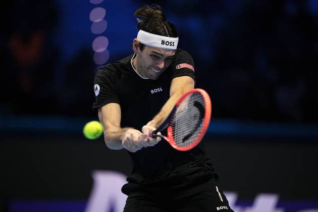 United States Taylor Fritz returns the ball to Italy s Jannik Sinner during& xa0;their singles tennis final match of the ATP, Tennis Herren World Tour Finals at the Inalpi Arena, in Turin, Italy - - Sunday, November 17, 2024.  Copyright: xMarcoxAlpozzi LaPressex