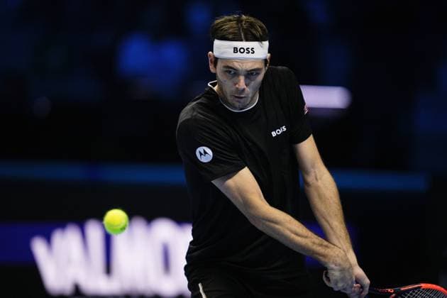 United States Taylor Fritz returns the ball to Italy s Jannik Sinner during& xa0;their singles tennis final match of the ATP, Tennis Herren World Tour Finals at the Inalpi Arena, in Turin, Italy - - Sunday, November 17, 2024.  Copyright: xMarcoxAlpozzi LaPressex