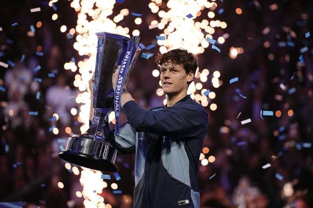 Italy s Jannik Sinner celebrates with the trophy after winning after the singles final tennis match of the ATP, Tennis Herren World Tour Finals against United States Taylor Fritz at the Inalpi Arena in Turin, Italy - - Sunday, November 17, 2024.  Copyright: xMarcoxAlpozzi LaPressex