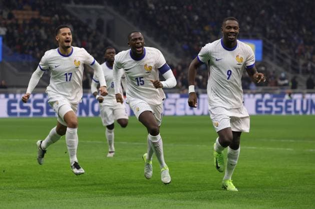 Milan, Italy, 17th November 2024. William Saliba, Ibrahima Konate and Marcus Thuram of France celebrate after teram mate Adrien Rabiot scored to give the side a 1-0 lead during the UEFA Nations League match at Stadio Giuseppe Meazza, Milan. Picture credit should read: Jonathan Moscrop Sportimage EDITORIAL USE ONLY. No use with unauthorised audio, video, data, fixture lists, club league logos or live services. Online in-match use limited to 120 images, no video emulation. No use in betting, games or single club league player publications. SPI-3453-0004