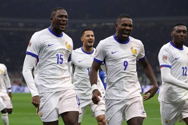 Milan, Italy, 17th November 2024. William Saliba, Ibrahima Konate and Marcus Thuram of France celebrate after teram mate Adrien Rabiot scored to give the side a 1-0 lead during the UEFA Nations League match at Stadio Giuseppe Meazza, Milan. Picture credit should read: Jonathan Moscrop Sportimage EDITORIAL USE ONLY. No use with unauthorised audio, video, data, fixture lists, club league logos or live services. Online in-match use limited to 120 images, no video emulation. No use in betting, games or single club league player publications. SPI-3453-0008