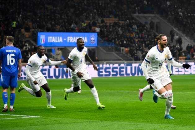 Adrien Rabiot of France celebrates with teammates after scoring the goal of 0-1 during the UEFA Nations League football match between Italy and France at San Siro stadium in Milano (Italy), November 17, 2024. AndreaxStaccioli