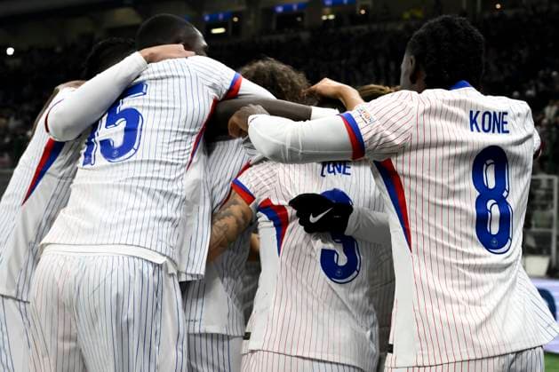 Adrien Rabiot of France celebrates with teammates after scoring the goal of 0-1 during the UEFA Nations League football match between Italy and France at San Siro stadium in Milano (Italy), November 17, 2024. AndreaxStaccioli
