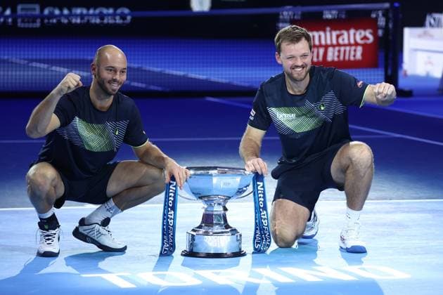 Krawietz Puetz vs Arevalo Pavic Kevin Krawietz and Tim Puetz of Germany celebrates with the trophy after winning the final doubles match between Kevin Krawietz of Germany and Tim Puetz of Germany against Marcelo Arevalo of El Salvador and Mate Pavic of Croatia on Day eight of the Nitto ATP, Tennis Herren World Tour Finals. Turin Inalpi Arena Italy Copyright: xMarcoxCanonierox