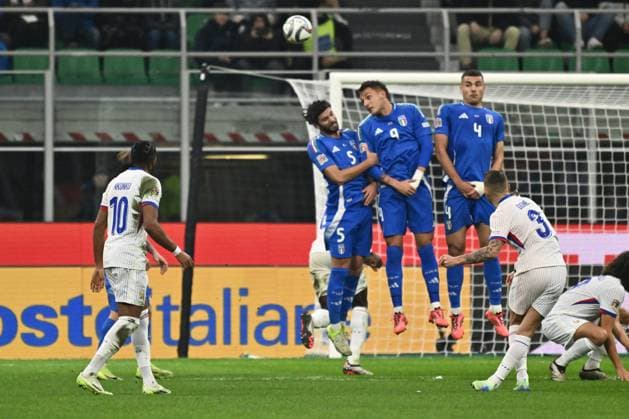 CALCIO - UEFA Nations League - Italy vs France Lucas Digne (FRA) is scoring the goal of 0-2 during the UEFA Nations League Matchday 6 match between Italy and FRance at the San Siro Stadium on November 17, 2024 in Milan, Italy. Milan Italy  Copyright: xIPAxSport ABACAx