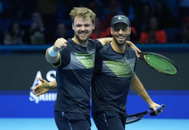 (241118) -- TURIN, Nov. 18, 2024 -- Kevin Krawietz (L) Tim Puetz celebrate after winning the men s doubles final match between Kevin Krawietz Tim Puetz of Germany and Marcelo Arevalo(El Salvador) Mate Pavic(Croatia) at the Nitto ATP, Tennis Herren Finals in Turin, Italy, on Nov. 17, 2024. ) (SP)ITALY-TURIN-TENNIS-ATP FINALS-MEN S DOUBLES-FINAL LixJing 