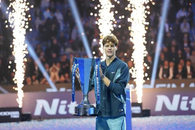 (241118) -- TURIN, Nov. 18, 2024 -- Winner Jannik Sinner of Italy poses with the trophy after winning the men s singles final match against Taylor Fritz of the United States at the ATP, Tennis Herren Finals in Turin, Italy, on Nov. 17, 2024. ) (SP)ITALY-TURIN-TENNIS-ATP FINALS-SINGLES FINAL LixJing 