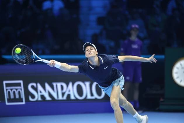 (241118) -- TURIN, Nov. 18, 2024 -- Jannik Sinner of Italy hits a return during the men s singles final match against Taylor Fritz of the United States at the ATP, Tennis Herren Finals in Turin, Italy, on Nov. 17, 2024. ) (SP)ITALY-TURIN-TENNIS-ATP FINALS-SINGLES FINAL LixJing 