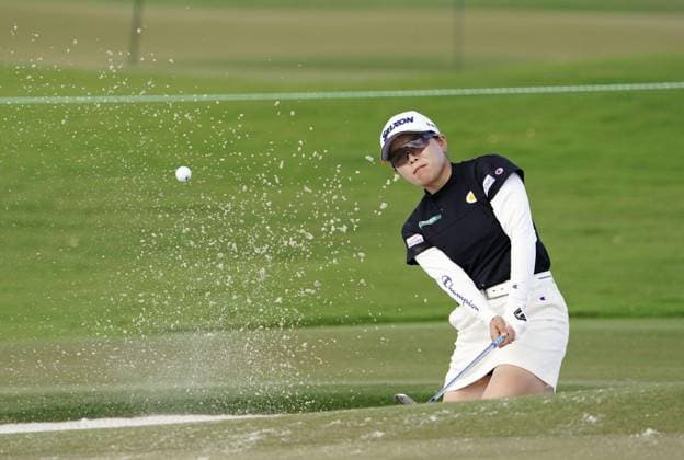 Golf: Annika tournament Minami Katsu of Japan hits out of a bunker on the 13th hole during the final round of the Annika golf tournament on Nov. 17, 2024, at Pelican Golf Club in Belleair, Florida.  A14AA0003751968P
