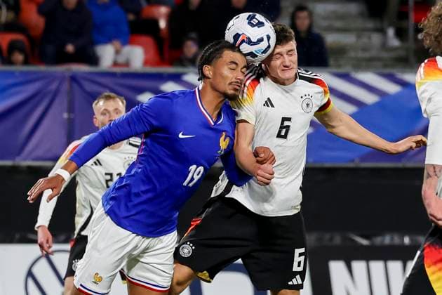 France, Valenciennes, 19 11 2024, Stade du Hainaut, France U21 v Germany U21 International Friendly, Nathan Zeze France and Eric Martel Germany battle for the ball Valenciennes Stade du Hainaut France eu-images-700
