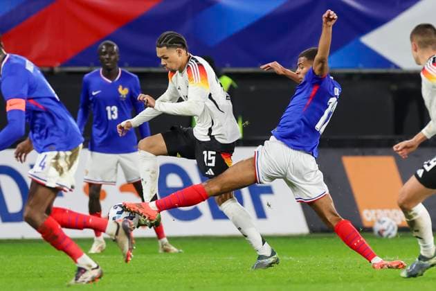France, Valenciennes, 19 11 2024, Stade du Hainaut, France U21 v Germany U21 International Friendly, Pharrel Nnamdi Collins Germany and Desire Doue France battle for the ball Valenciennes Stade du Hainaut France eu-images-700