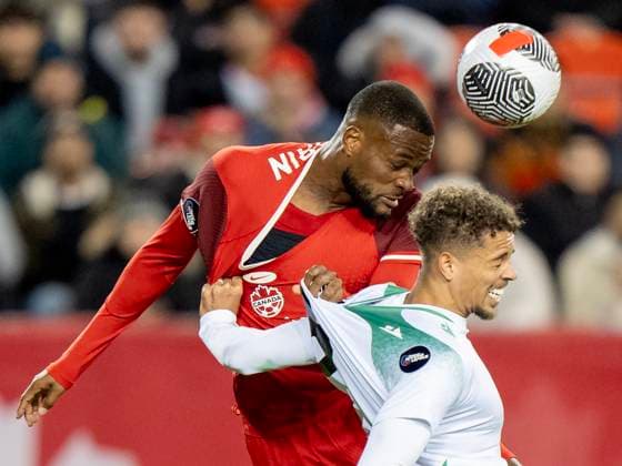 November 19, 2024, Toronto, On, CANADA: Canada forward Cyle Larin, left, and Suriname midfielder Justin Lonwijk battle for a header in CONCACAF Nations League action in Toronto, Tuesday, Nov. 19, 2024. Canada News - November 19, 2024  - ZUMAc35_ 20241119_zaf_c35_138 Copyright: xFrankxGunnx