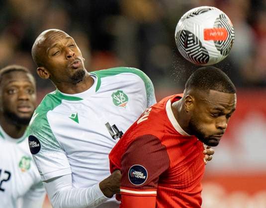 November 19, 2024, Toronto, On, CANADA: Canada forward Cyle Larin, right, and Suriname midfielder Dion Malone (4) battle for a header in CONCACAF Nations League action in Toronto, Tuesday, Nov. 19, 2024. Canada News - November 19, 2024  - ZUMAc35_ 20241119_zaf_c35_139 Copyright: xFrankxGunnx