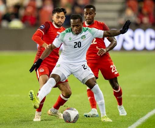 November 19, 2024, Toronto, On, CANADA: Suriname forward Gleofilo Vlijter (20) battles with Canada midfielder Mathieu Choinere and his teammate Richmond Laryea (22) in CONCACAF Nations League action in Toronto, Tuesday, Nov. 19, 2024. Canada News - November 19, 2024  - ZUMAc35_ 20241119_zaf_c35_140 Copyright: xFrankxGunnx