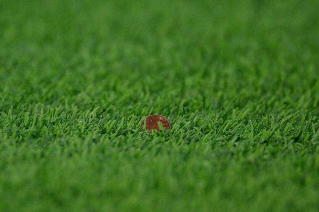 241121 A coin on the pitch during the Women s Champions League football match between Hammarby and Manchester City on November 21, 2024 in Stockholm Photo Simon Hastegard BILDBYRAN kod SH SH0547 fotboll football soccer fotball uefa womens champions league hammarby manchester city dam bbeng  Copyright: SIMONxHASTEGARD BB241121SH032