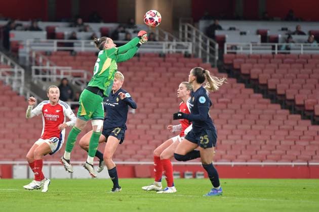 Pauline Peyraud-Manin of Juventas Women ties to meet the costed ball during the Womens Champions League match between Arsenal Women and Juventus Femminile at the Emirates Stadium, London, England on 21 November 2024. Copyright: xPhilxHutchinsonx 42110013