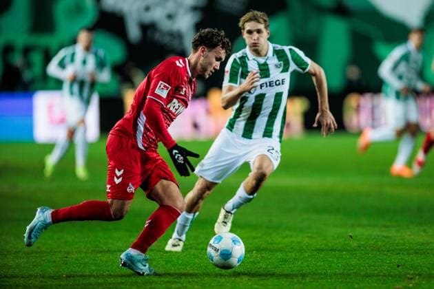 2 Soccer Bundesliga, Preußen Münster 1 FC Köln 22 11 2024 duel Luca Waldschmidt 1 FC Köln, 9 , Luca Bolay Preußen Münster, 25 2 Soccer Bundesliga, Preußen Münster 1 FC Köln, Münster, Preussenstadion am 22 11 2024 DFL REGULATIONS PROHIBIT ANY USE OF PHOTOGRAPHS AS IMAGE SEQUENCES AND OR QUASI VIDEO Copyright: xBEAUTIFULxSPORTS Wunderlx