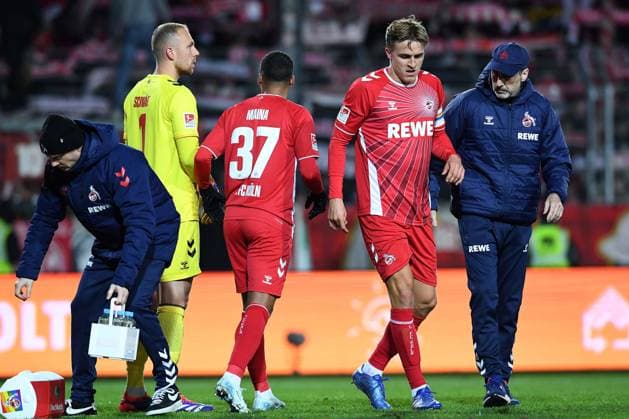 Soccer 2 Bundesliga 13 Matchday SC Preußen Münster 1 FC Köln on 22 11 2024 at Preußenstadion in Münster Timo Hübers Köln is led off the pitch injured DFL regulations prohibit any use of photographs as image sequences and or quasi video xRx
