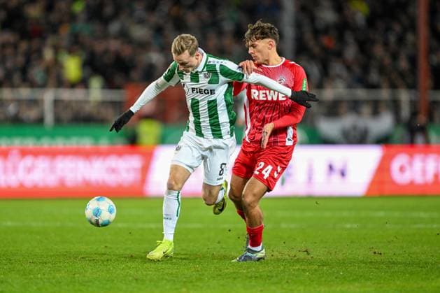 2 Bundesliga SC Preußen Münster 1 FC Köln on 22 11 2024 at the Preußenstadion in Münster Niko Koulis Muenster in a duel against Timo Hübers Huebers Koeln MT