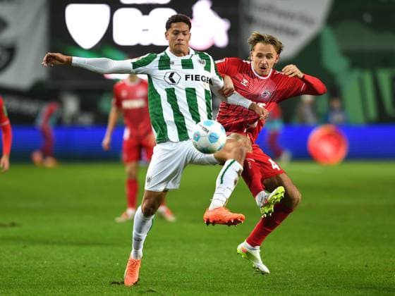Andras Nemeth Preussen Muenster and Mathias Olesen 1 FC Koeln battle for the ball during the 2 Bundesliga match between Preußen Münster and 1 FC Köln at Preußenstadion on November 22, 2024 in Münster, Germany Germany Photo by Ralf Treese DeFodi Images Andras Nemeth Preussen Muenster and Mathias Olesen 1 FC Koeln battle for the ball during the 2 Bundesliga match between Preußen Münster and 1 FC Köln at Preußenstadion on November 22, 2024 in Münster, Germany Photo by Ralf Treese DeFodi Images DFB DFL REGULATIONS PROHIBIT ANY USE OF PHOTOGRAPHS AS IMAGE SEQUENCES AND OR QUASI VIDEO Defodi 521 SCPKOE20241122 020 Defodi-521 not used in POL SRB CRO FRA GBR NED ITA USA DFB DFL REGULATIONS PROHIBIT ANY USE OF PHOTOGRAPHS AS IMAGE SEQUENCES AND OR QUASI-VIDEO.