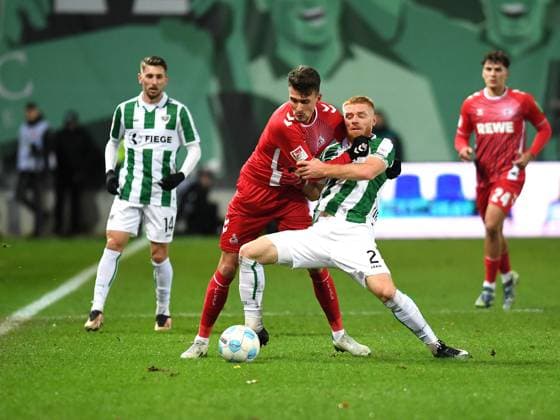 Dejan Ljubicic 1 FC Köln and Mikkel Kirkeskov Preussen Muenster battle for the ball during the 2 Bundesliga match between Preußen Münster and 1 FC Köln at Preußenstadion on November 22, 2024 in Münster, Germany Germany Photo by Ralf Treese DeFodi Images Dejan Ljubicic 1 FC Köln and Mikkel Kirkeskov Preussen Muenster battle for the ball during the 2 Bundesliga match between Preußen Münster and 1 FC Köln at Preußenstadion on November 22, 2024 in Münster, Germany Photo by Ralf Treese DeFodi Images DFB DFL REGULATIONS PROHIBIT ANY USE OF PHOTOGRAPHS AS IMAGE SEQUENCES AND OR QUASI VIDEO Defodi 521 SCPKOE20241122 023 Defodi-521 not used in POL SRB CRO FRA GBR NED ITA USA DFB DFL REGULATIONS PROHIBIT ANY USE OF PHOTOGRAPHS AS IMAGE SEQUENCES AND OR QUASI-VIDEO.