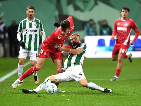 Dejan Ljubicic 1 FC Köln and Mikkel Kirkeskov Preussen Muenster battle for the ball during the 2 Bundesliga match between Preußen Münster and 1 FC Köln at Preußenstadion on November 22, 2024 in Münster, Germany Germany Photo by Ralf Treese DeFodi Images Dejan Ljubicic 1 FC Köln and Mikkel Kirkeskov Preussen Muenster battle for the ball during the 2 Bundesliga match between Preußen Münster and 1 FC Köln at Preußenstadion on November 22, 2024 in Münster, Germany Photo by Ralf Treese DeFodi Images DFB DFL REGULATIONS PROHIBIT ANY USE OF PHOTOGRAPHS AS IMAGE SEQUENCES AND OR QUASI VIDEO Defodi 521 SCPKOE20241122 024 Defodi-521 not used in POL SRB CRO FRA GBR NED ITA USA DFB DFL REGULATIONS PROHIBIT ANY USE OF PHOTOGRAPHS AS IMAGE SEQUENCES AND OR QUASI-VIDEO.