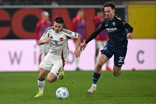 Paderborn, Home Deluxe Arena, 22 11 24, GER, Men, 2 Bundesliga, Season 2024 2025, SC Paderborn 07 1 FC Nuernberg Picture from left in duel Oliver VILLADSEN Nuernberg and Aaron ZEHNTER Paderborn Only for editorial use DFL regulations prohibit any use of photographs as image sequences and or quasi video NRW Germany