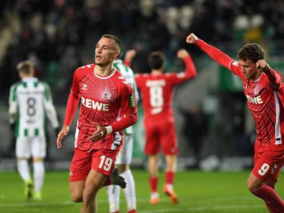 Tim Lemperle 1 FC Koeln and Luca Waldschmidt 1 FC Koeln celebrates after scoring his team™s first goal during the 2 Bundesliga match between Preußen Münster and 1 FC Köln at Preußenstadion on November 22, 2024 in Münster, Germany, Germany Photo by Ralf Treese DeFodi Images Tim Lemperle 1 FC Koeln and Luca Waldschmidt 1 FC Koeln celebrates after scoring his team™s first goal with teammates during the 2 Bundesliga match between Preußen Münster and 1 FC Köln at Preußenstadion on November 22, 2024 in Münster, Germany Photo by Ralf Treese DeFodi Images DFB DFL REGULATIONS PROHIBIT ANY USE OF PHOTOGRAPHS AS IMAGE SEQUENCES AND OR QUASI VIDEO Defodi 521 SCPKOE20241122 030 Defodi-521 not used in POL SRB CRO FRA GBR NED ITA USA DFB DFL REGULATIONS PROHIBIT ANY USE OF PHOTOGRAPHS AS IMAGE SEQUENCES AND OR QUASI-VIDEO.