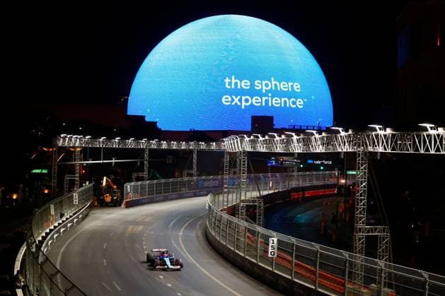 LAS VEGAS, NV - NOVEMBER 22: Yuki Tsunoda (22) of Japan, Visa Cash App RB Formula One Team, RB Honda RBPT takes a turn along Sands Ave. with the MSG Sphere in the background during free practice 3 ahead of the Formula 1 Heineken Silver Las Vegas Grand Prix on the Las Vegas Strip Circuit on November 22, 2024 in Las Vegas, Nevada. (Photo by Jeff Speer Icon Sportswire) AUTO: NOV 22 F1 Heineken Silver Las Vegas Grand Prix EDITORIAL USE ONLY Icon2411220781
