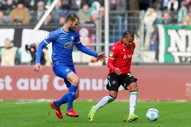 Aleksandar Vukotic SV Darmstadt 98 and Monju Momuluh Hannover 96 battle for the ball, 2 Bundesliga, Hannover 96 vs SV Darmstadt 98, Heinz von Heiden Arena, November 23, 2024 in Hanover, Germany Photo by Marco Steinbrenner DeFodi Images Aleksandar Vukotic SV Darmstadt 98 and Monju Momuluh Hannover 96 battle for the ball, 2 Bundesliga, Hannover 96 vs SV Darmstadt 98, Heinz von Heiden Arena, November 23, 2024 in Hanover, Germany Photo by Marco Steinbrenner DeFodi Images DFB DFL REGULATIONS PROHIBIT ANY USE OF PHOTOGRAPHS AS IMAGE SEQUENCES AND OR QUASI VIDEO Defodi 700 hannover darmstadt 20241123 029 Defodi-700 DFB DFL REGULATIONS PROHIBIT ANY USE OF PHOTOGRAPHS AS IMAGE SEQUENCES AND OR QUASI-VIDEO.