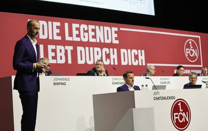 23 11 2024 Football Season 2024 2025 2 Football Bundesliga General Meeting Annual General Meeting JHV 2024 Sportfoto Zink DaMa xdaxmax Niels Rossow Board Member Strategy Marketing 1 FC Nuremberg FCN speaks to members Joti Chatzialexiou Board Member Sport 1 FC Nuremberg FCN Stefan Heim Board Member Finance for Accounting Controlling and Financial Accounting 1 FC Nuremberg FCN listen to