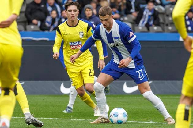 Berlin, 23 11 24, Soccer, 2 Bundesliga, Matchday 13, Hertha BSC SSV Ulm 1846, Olympiastadion Max Brandt of SSV Ulm fights for the ball against Berlins Mickal Cuisance DFL regulations and DFB regulations prohibit any use of photographs as image sequences and or quasi video, Foto Andreas Gora Hertha BSC SSV Ulm 1846