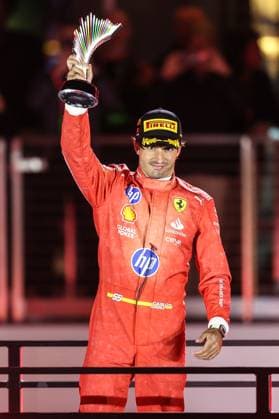 November 23, 2024: Ferrari driver Carlos Sainz (55) stands on the podium and raises the 3rd place trophy during the Formula One Heineken Silver Las Vegas Grand Prix 2024 on the Las Vegas Street Circuit in Las Vegas, NV. CSM. Las Vegas United States of America - ZUMAc04_ 20241123_zma_c04_896 Copyright: xChristopherxTrimx