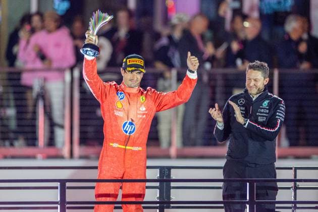 23rd November 2024; Las Vegas, Nevada, USA. F1 Las Vegas Grand Prix; Race Day; Carlos Sainz (55) of Spain and team Scuderia Ferrari celebrates P3 on the podium  ActionPlus12719561 BobxKupbens
