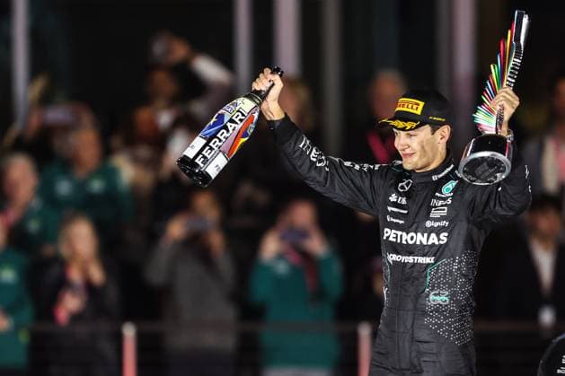 Formula 1 2024: Formula 1 Las Vegas Grand Prix NOV 23. November 23, 2024: Mercedes-AMG Petronas F1 Team driver George Russell (63) raises a bottle of champagne and the championship trophy after finishing in first place during the Formula One Heineken Silver Las Vegas Grand Prix 2024 on the Las Vegas Street Circuit in Las Vegas, NV. Christopher Trim CSM. (Credit Image: Â Christopher Trim Cal Media) Las Vegas Nevada United States of America EDITORIAL USE ONLY Copyright: xx ZUMA-20241123_zma_c04_872.jpg ChristopherxTrimx csmphotothree324824