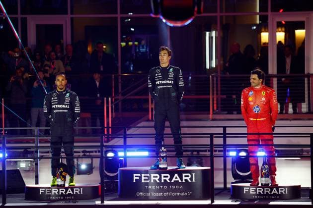 LAS VEGAS, NV - NOVEMBER 23: George Russell (63) of Great Britain, Mercedes-AMG PETRONAS F1, Team Mercedes stands on the 1st place podium alongside teammate Lewis Hamilton (44, 2nd place left) of Great Britain, and Carlos Sainz (55, 3rd place, right) of Spain, Scuderia Ferrari at the completion of the Formula 1 Heineken Silver Las Vegas Grand Prix on the Las Vegas Strip Circuit on November 23, 2024 in Las Vegas, Nevada. (Photo by Jeff Speer Icon Sportswire) AUTO: NOV 23 F1 Heineken Silver Las Vegas Grand Prix EDITORIAL USE ONLY Icon2411231651