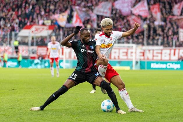 24 11 2024, Soccer, GER, Season, 2 Liga, Season 2024 2025, Matchday 13, SSV Jahn Regensburg 1 FC Magdeburg Silas Gnaka vs Bryan Hein SSV Jahn DFL REGULATIONS PROHIBIT ANY USE OF PHOTOGRAPHS AS IMAGE SEQUENCES AND OR QUASI VIDEO Regensburg Bayern Germany Jahnstadion Regensburg