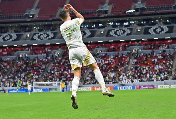 AFC CHAMPIONS LEAGUE ELITE, AL GHARAFA SC (QTR) v AL NASSR FC (KSA) Cristiano Ronaldo of Al Nassr FC celebrates after scoring a goal during the AFC Champions League elite west football match between Qatar s Al Gharafa SC and Saudi Arabia s Al Nassr FC at Al-Bayt Stadium in Al Khor, Qatar, on November 25, 2024 DOHA Qatar Copyright: xNAUSHADx