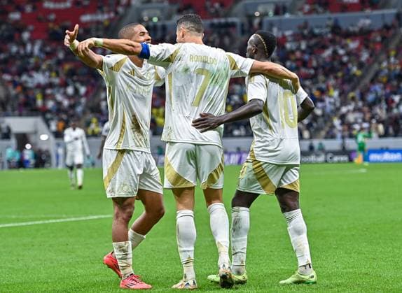 AFC CHAMPIONS LEAGUE ELITE, AL GHARAFA SC (QTR) v AL NASSR FC (KSA) Cristiano Ronaldo (C) of Al Nassr FC celebrates after scoring a goal during the AFC Champions League elite west football match between Qatar s Al Gharafa SC and Saudi Arabia s Al Nassr FC at Al-Bayt Stadium in Al Khor, Qatar, on November 25, 2024 DOHA Qatar Copyright: xNAUSHADx