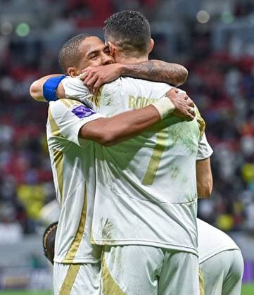 AFC CHAMPIONS LEAGUE ELITE, AL GHARAFA SC (QTR) v AL NASSR FC (KSA) Cristiano Ronaldo (R) of Al Nassr FC celebrates after scoring a goal during the AFC Champions League elite west football match between Qatar s Al Gharafa SC and Saudi Arabia s Al Nassr FC at Al-Bayt Stadium in Al Khor, Qatar, on November 25, 2024 DOHA Qatar Copyright: xNAUSHADx
