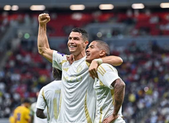 AFC CHAMPIONS LEAGUE ELITE, AL GHARAFA SC (QTR) v AL NASSR FC (KSA) Cristiano Ronaldo (L) of Al Nassr FC celebrates after scoring a goal during the AFC Champions League elite west football match between Qatar s Al Gharafa SC and Saudi Arabia s Al Nassr FC at Al-Bayt Stadium in Al Khor, Qatar, on November 25, 2024 DOHA Qatar Copyright: xNAUSHADx