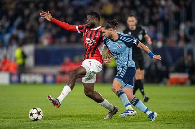 Youssouf Fofana and Kyriakos Savvidis during UEFA Champions league match, SK Slovan Bratislava - AC Milan , 26. november 2024, Tehelne pole Stadium, Bratislava, Slovakia Copyright: xMICHALxFAJT,ZOSPORTU.SKx FAJ_5055