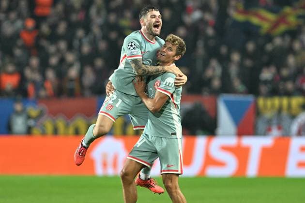 Javi Galan, left, and Marcos Llorente of Atletico celebrate a goal during the football Champions League 5th round match Sparta Praha vs Atletico Madrid in Prague, Czech Republic, November 26, 2024. (CTKxPhoto MichaelaxRihova) CTKPhotoP2024112607097  CTKPhotoP2024112607097