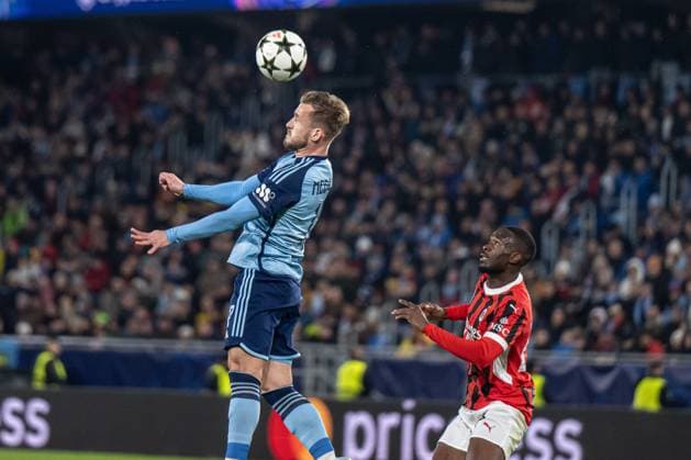 urij Medvedev in a head to head battle during UEFA Champions league match, SK Slovan Bratislava - AC Milan , 26. november 2024, Tehelne pole Stadium, Bratislava, Slovakia Copyright: xMICHALxFAJT,ZOSPORTU.SKx DSC_6929