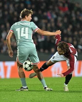Marcos Llorente of Atletico, left, and Markus Solbakken of Sparta in action during the football Champions League 5th round match Sparta Praha vs Atletico Madrid in Prague, Czech Republic, November 26, 2024. (CTKxPhoto MichaelaxRihova) CTKPhotoP2024112607539  CTKPhotoP2024112607539