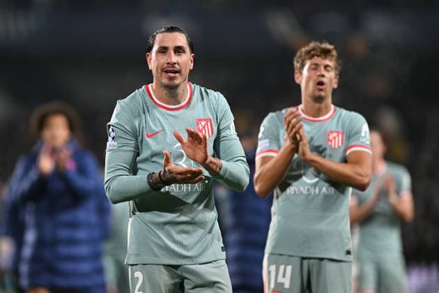 Jose Maria Gimenez, left, and Marcos Llorente of Atletico celebrate after winning the football Champions League 5th round match Sparta Praha vs Atletico Madrid in Prague, Czech Republic, November 26, 2024. (CTKxPhoto MichaelaxRihova) CTKPhotoP2024112607714  CTKPhotoP2024112607714